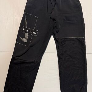 Nike Men's Black Joggers with Silver Logo